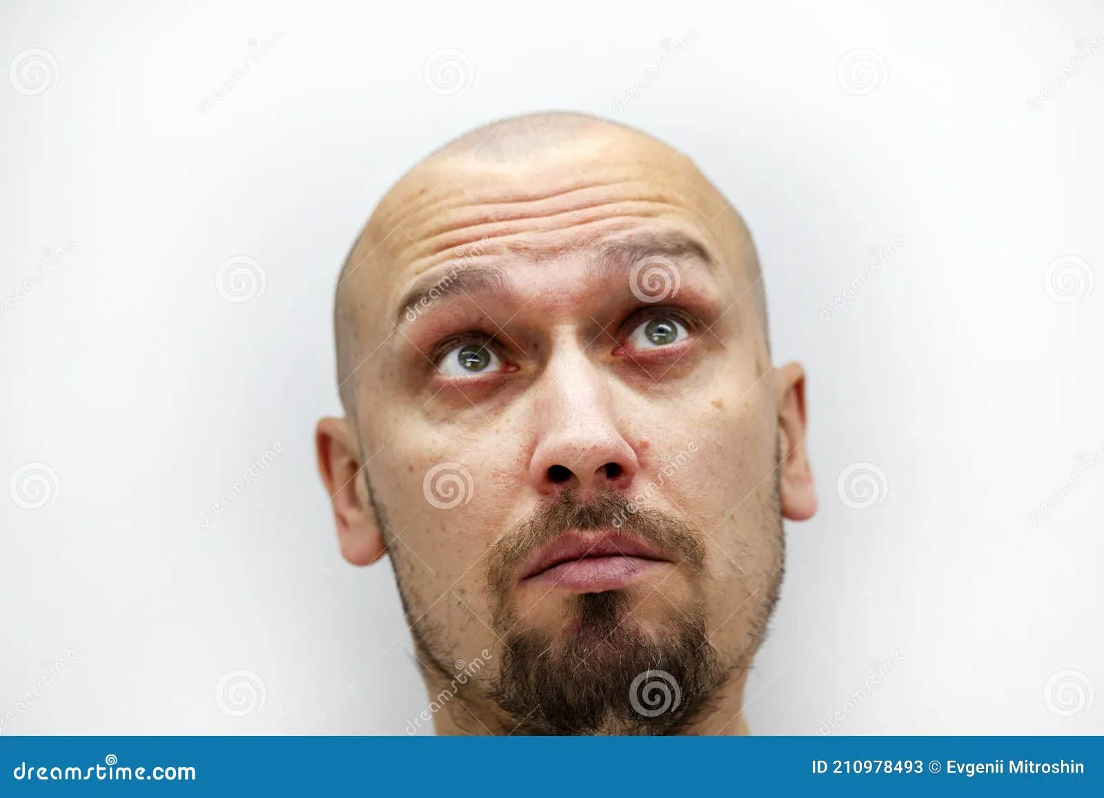 man with thin beard and different facial expressions